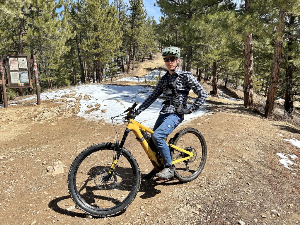 Spencer riding an e-MTB.