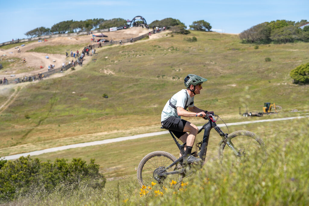 Spencer racing an e-MTB