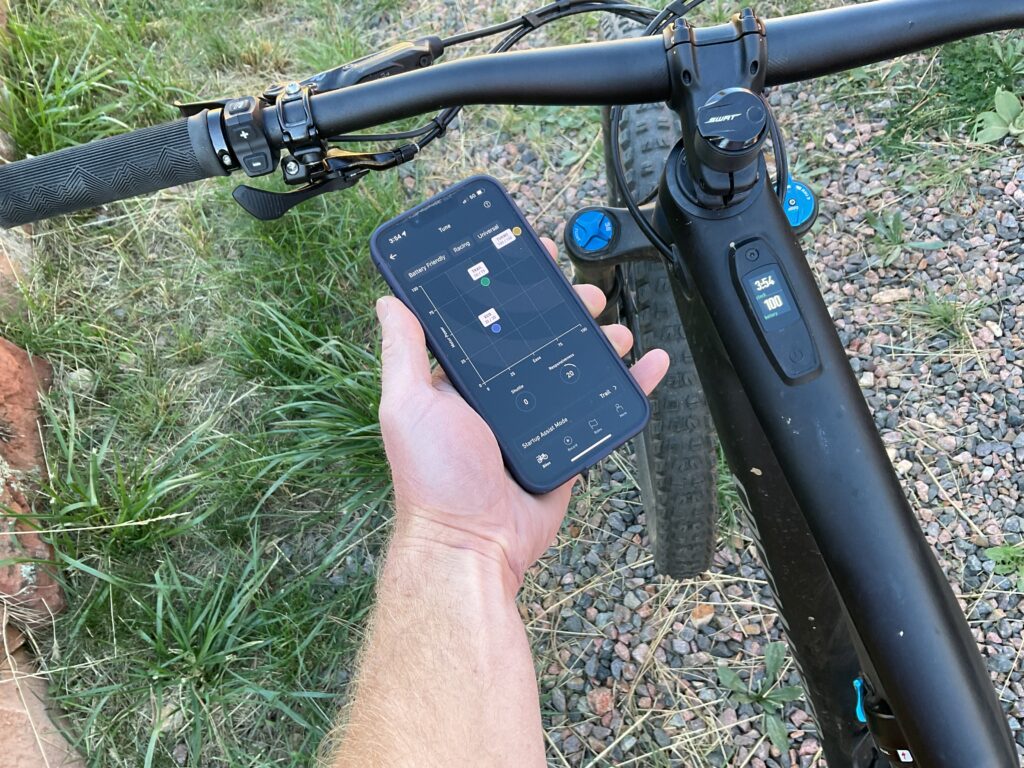 Adjusting e-bike motor tune with the Specialized app.